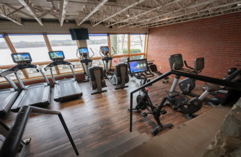 Cardio floor with ellipticals treadmills and stationary bikes at Apex Personal Fitness Youngstown NY