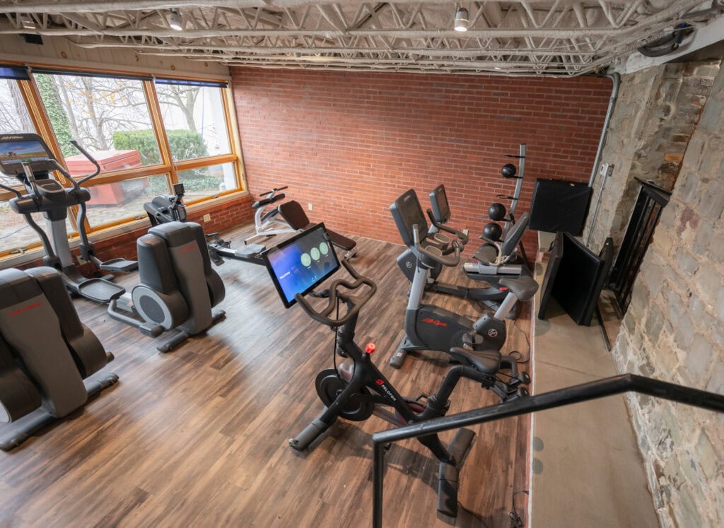 Recumbent bikes and ellipticals in cardio section at Apex Personal Fitness Youngstown NY
